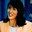 Jen laughs reading the news,Nov 1995